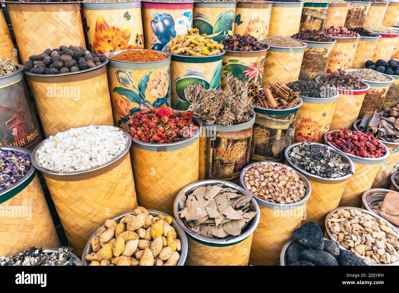 Dubai Spice Souk. Traditional bazaar in Dubai, United Arab Emirates (UAE) Selling a variety of fragrances and spices, herbs. - Stock Image