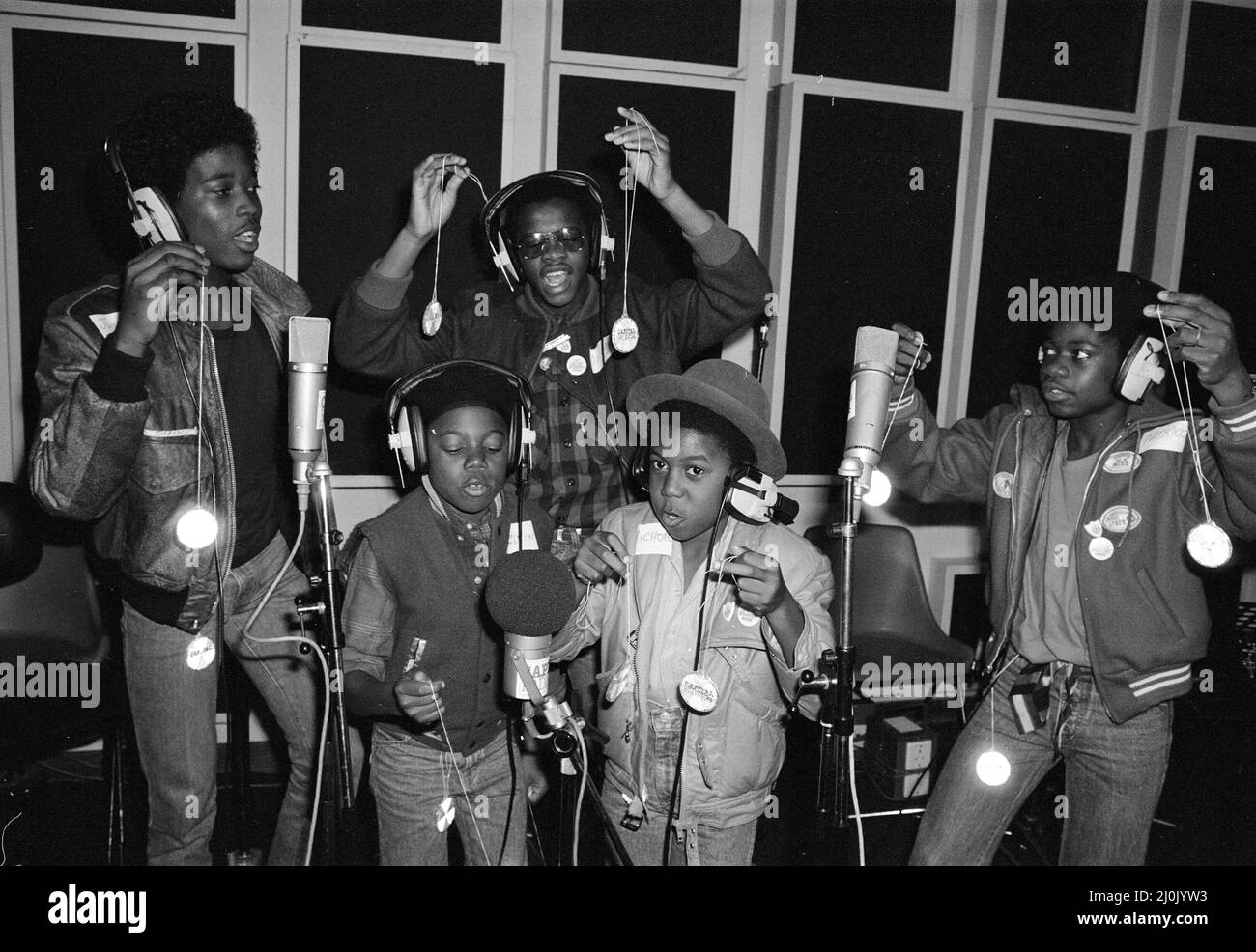 Musical Youth, British Jamaican pop / reggae group, at Capital Radio studios in London where they are helping to launch a road safety campaign involving glitter discs 8th October 1982.  Members of the group are: Freddie Waite a.k.a. Junior, Dennis Seaton, Patrick Waite, Michael Grant & Kelvin Grant Stock Photo