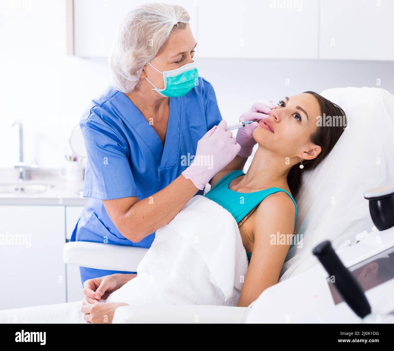 Person Getting Face Injection Woman getting facial injection hi-res stock photography and images - Alamy
