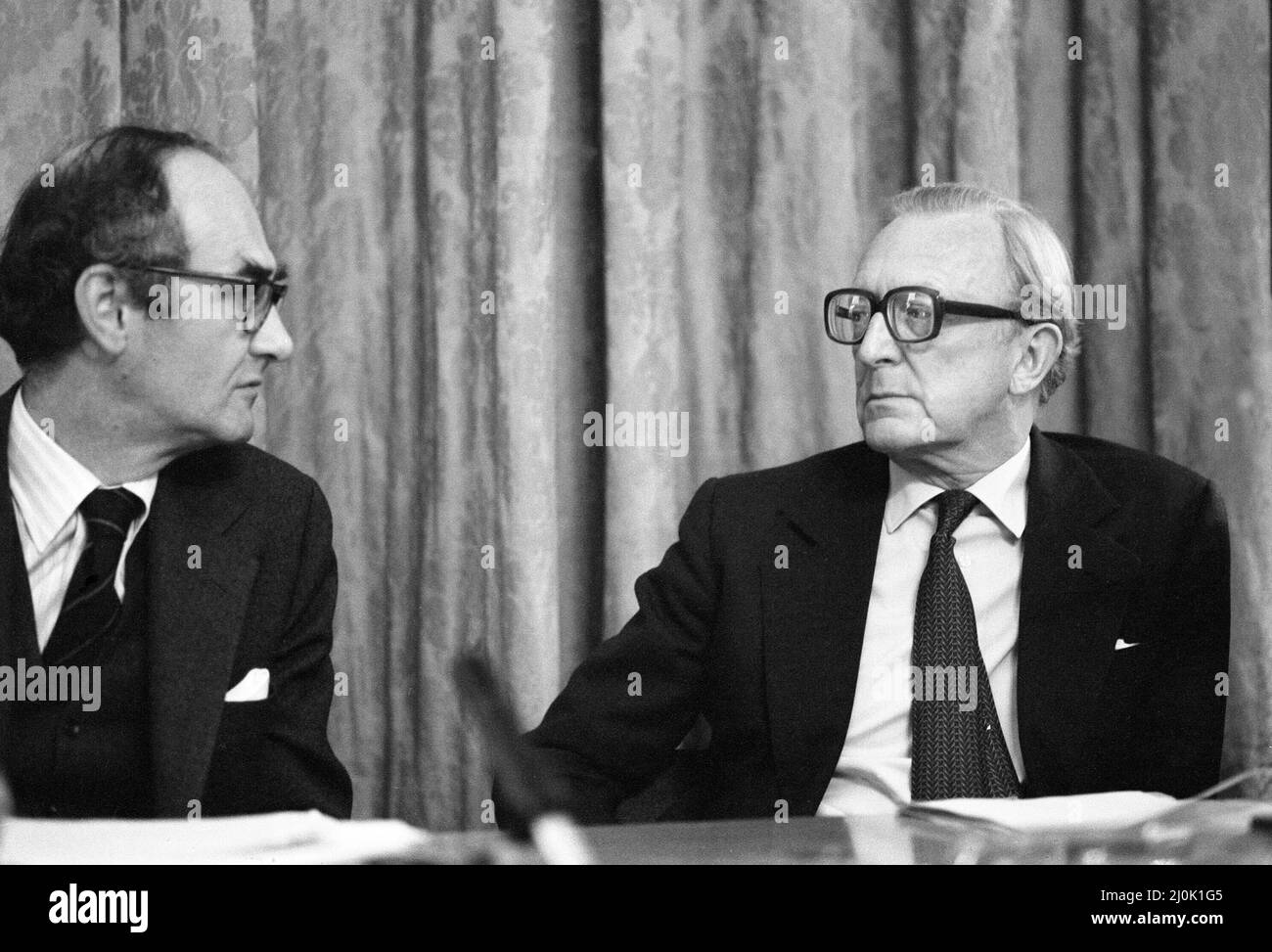 Foreign Secretary Lord Carrington and Defence Secretary John Nott at a press conference held at the Foreign office to make a statement on the Falklands invasion by Argentina.  2nd April 1982. Stock Photo