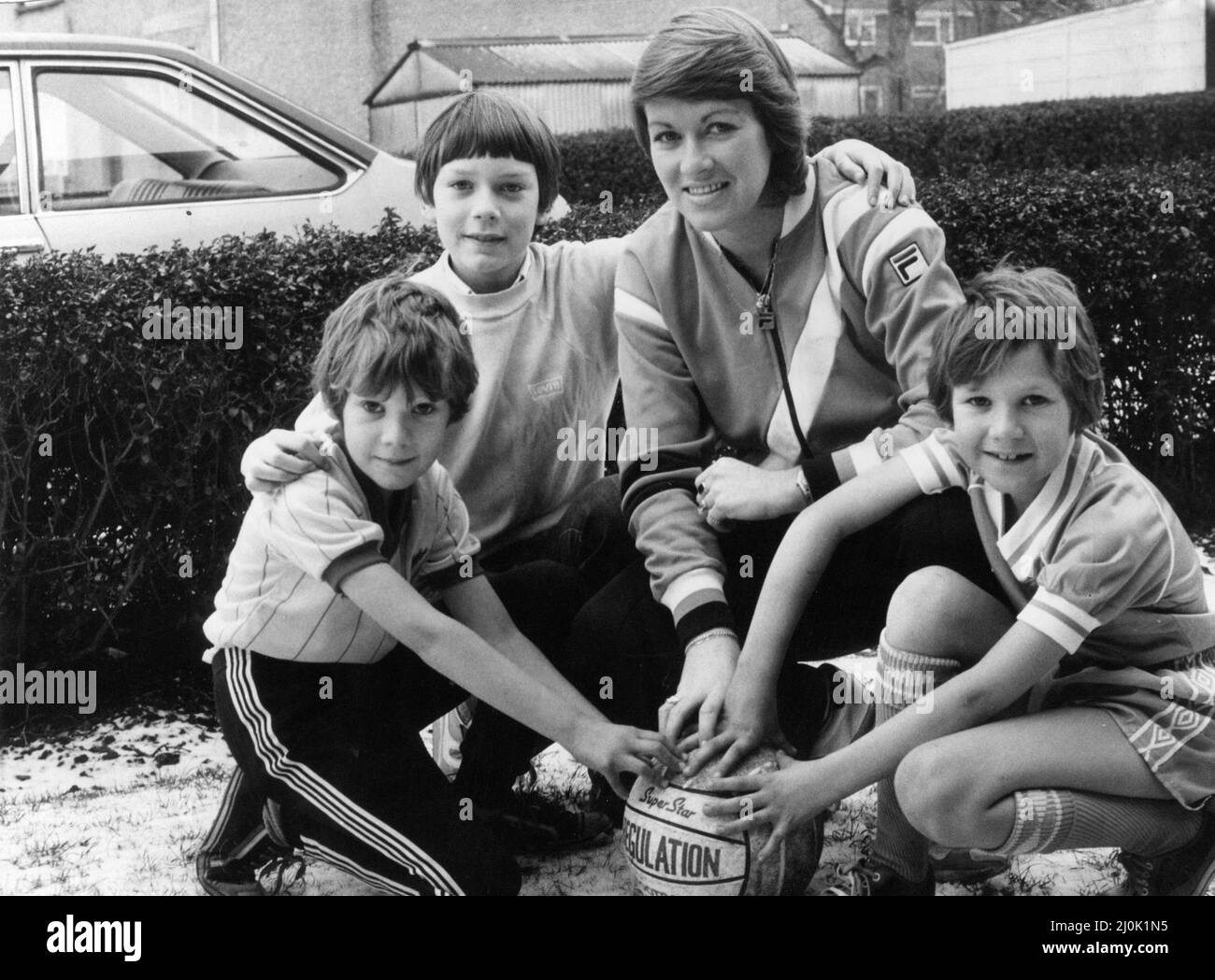 Rose Reilly, 26, Scottish Women's Association Football player from Stewart, Ayrshire, has been playing professional football in Italy for the past seven years, pictured back home for New Year, with her young neighbours and fans, Neil and Ian Campbell and Jim Barclay, Published Sunday Mail 27th December 1981. Rose Reilly currently plays for A.C.F. Alaska Lecce,  in front of crowds of 5000. Stock Photo