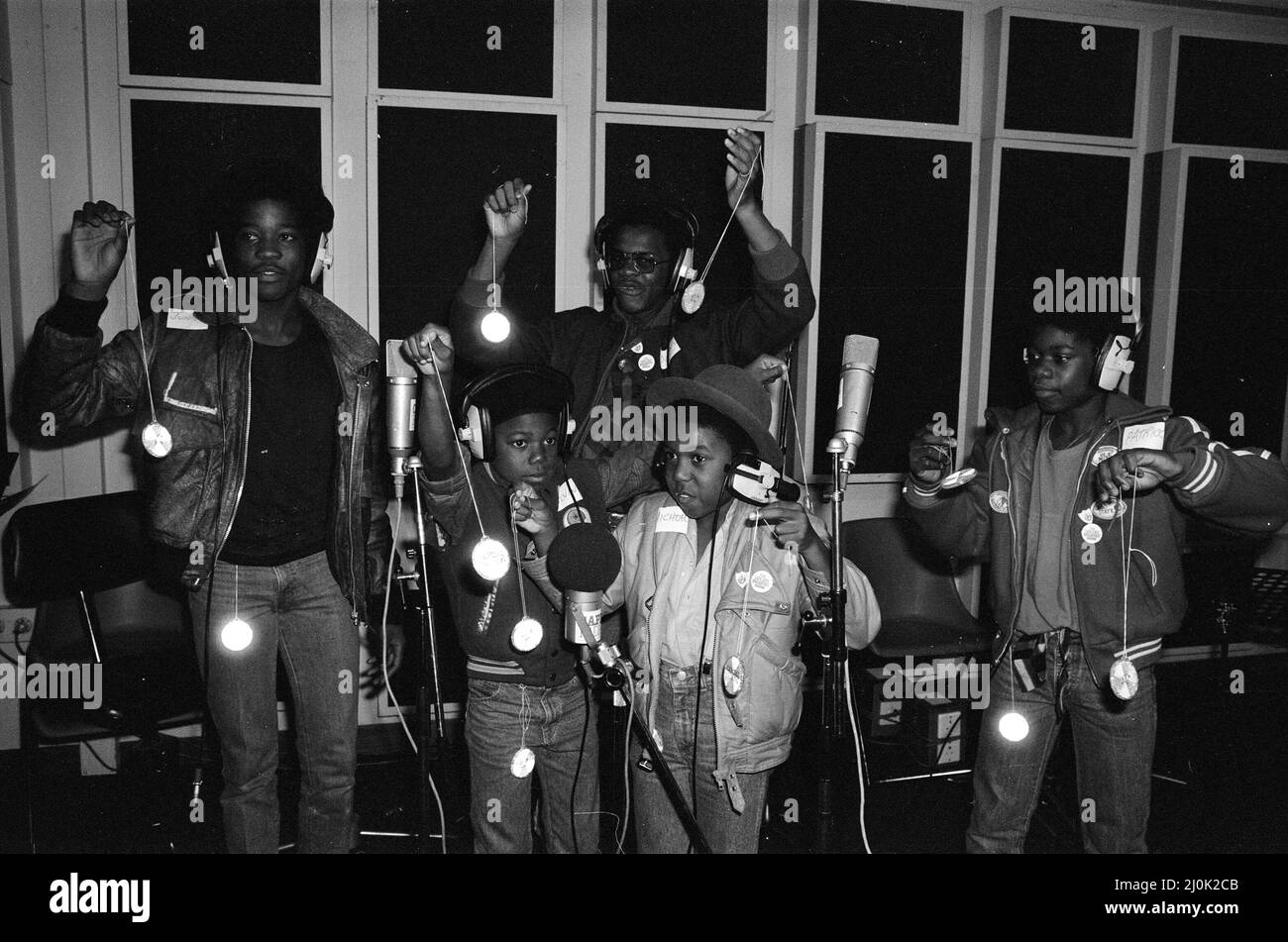 Musical Youth, British Jamaican pop / reggae group, at Capital Radio  studios in London where they are helping to launch a road safety campaign  involving glitter discs 8th October 1982. Members of