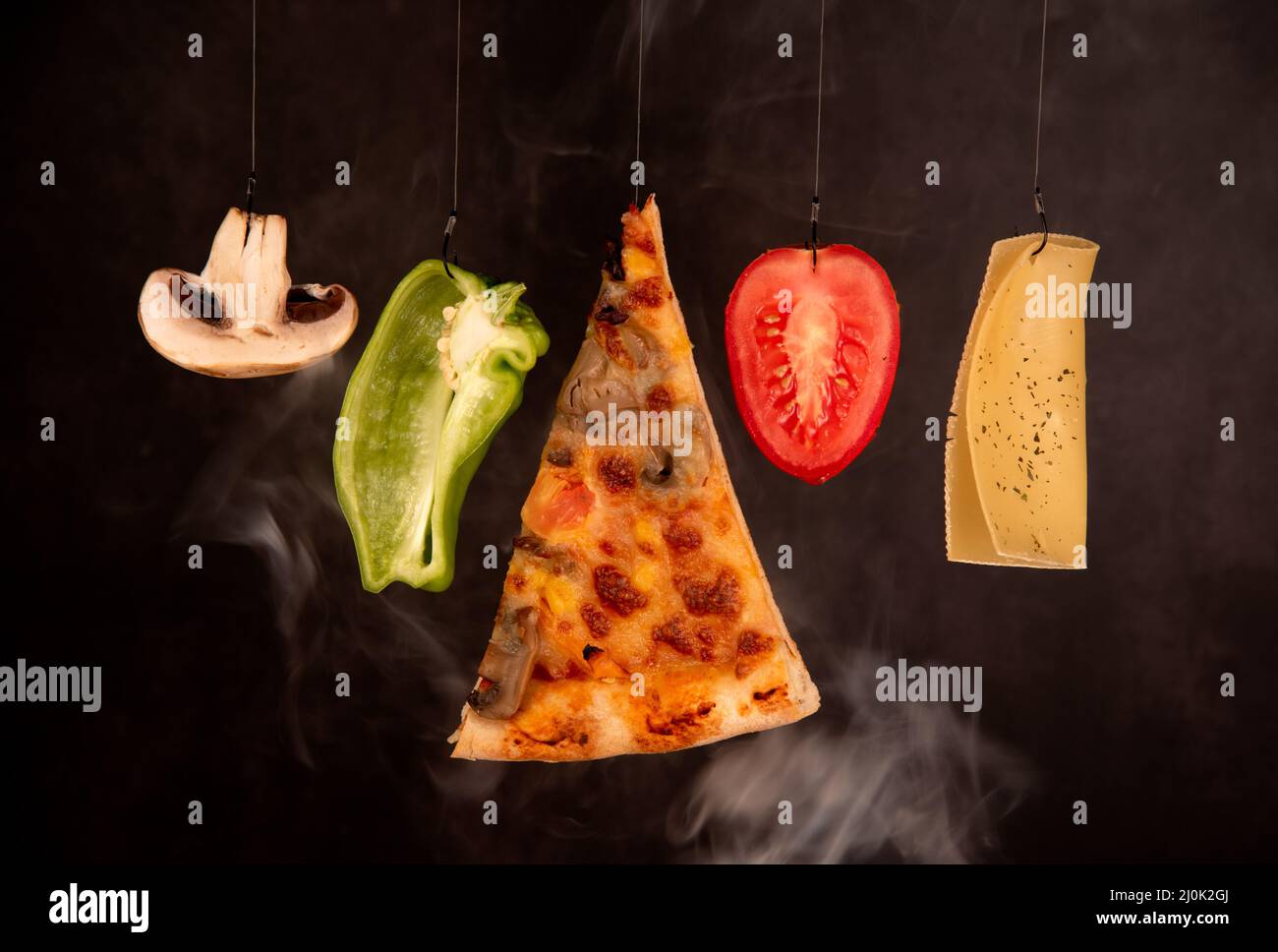 Slice of mozzarella delicious pizza tomato cheese peeper and mushroom ingredients. Food preparing Stock Photo