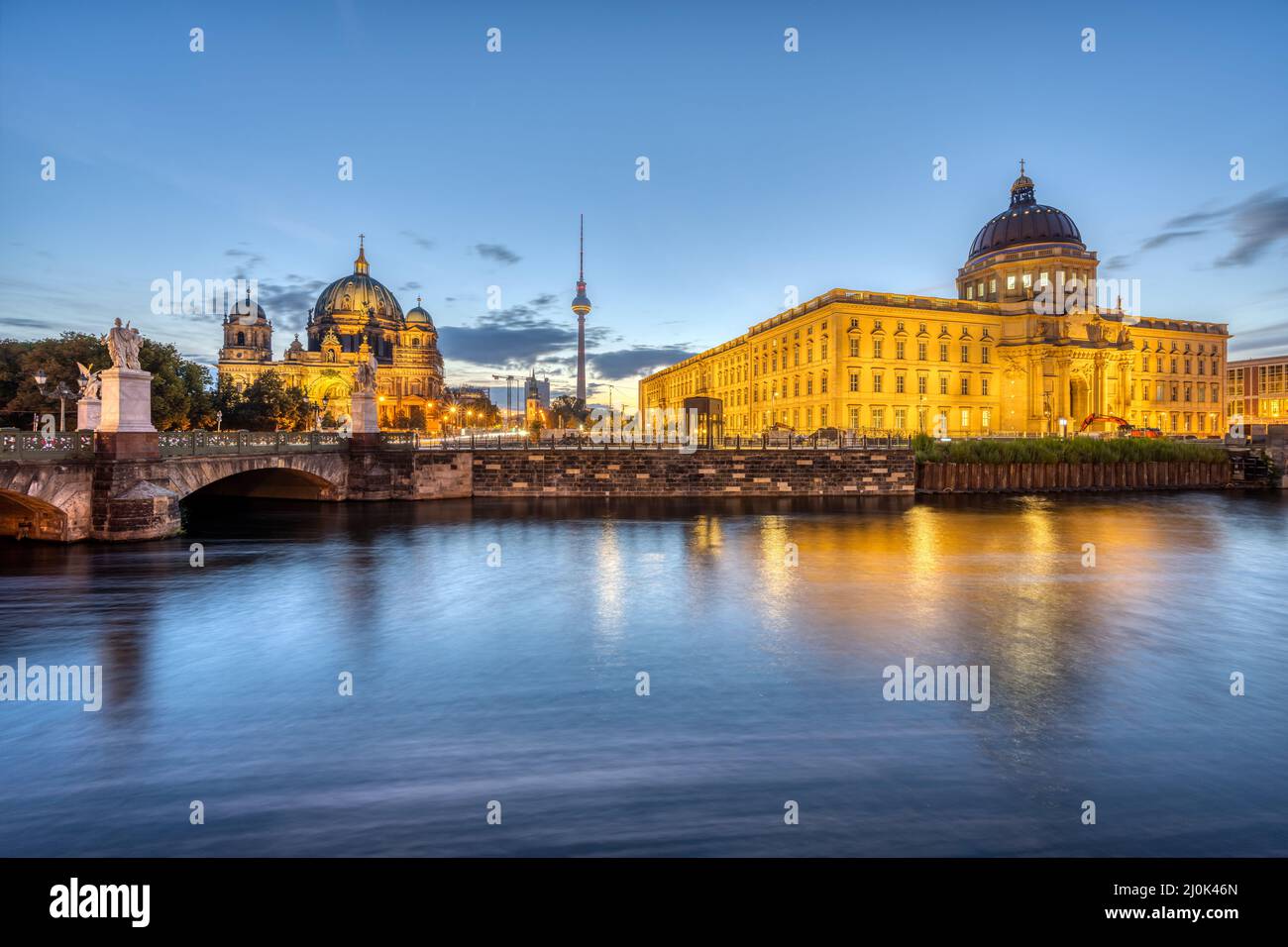 The City Palace, the Cathedral and the TV Tower in Berlin before sunrise Stock Photo
