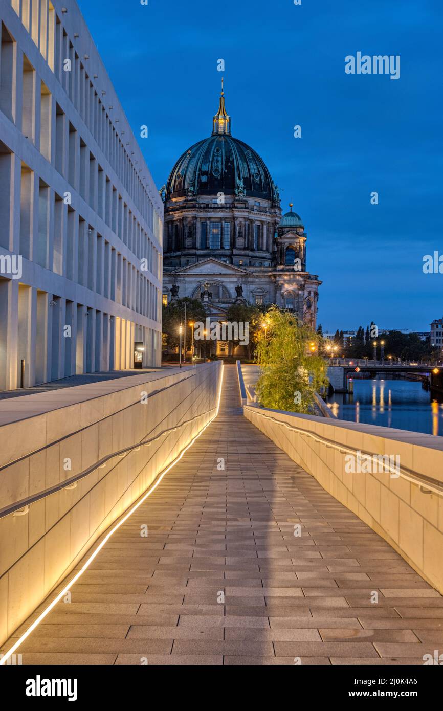 The modern backside of the City Palace with the Cathedral in the back at night Stock Photo