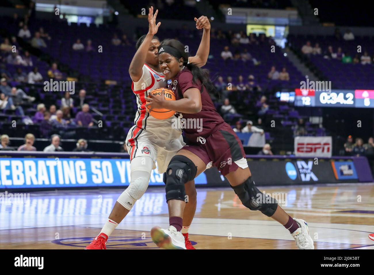 March 19, 2022: Missouri St. Ifunanya Nwachukwu (13) drives to the basket past an Ohio St. defender during NCAA Women's March Madness Tournament action between the Ohio St. Buckeyes and the Missouri St. Bears at the Pete Maravich Assembly Center in Baton Rouge, LA. Jonathan Mailhes/CSM Stock Photo