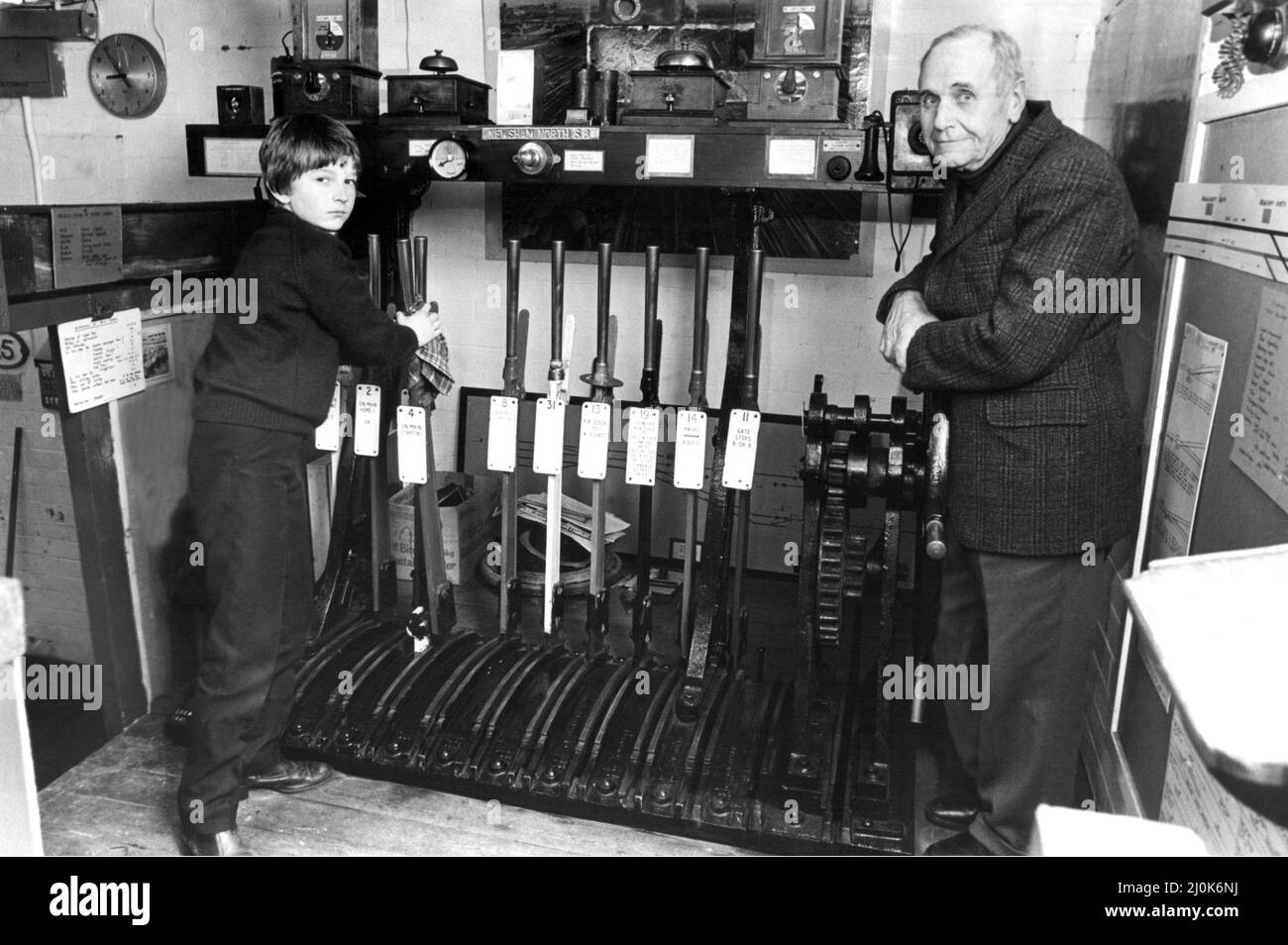 Twelve year old Martin with Mr. Sinclair at the Blyth Railway Museum, set in a converted school toilet block.  This fully working signal box restored by museum chairman Mr. John Sinclair, aged 72, Blyth's last station master on 1st February 1982 Stock Photo