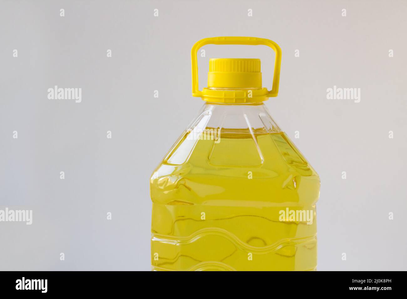 Five liter sunflower oil in a plastic bottle on white background. with copy space Stock Photo