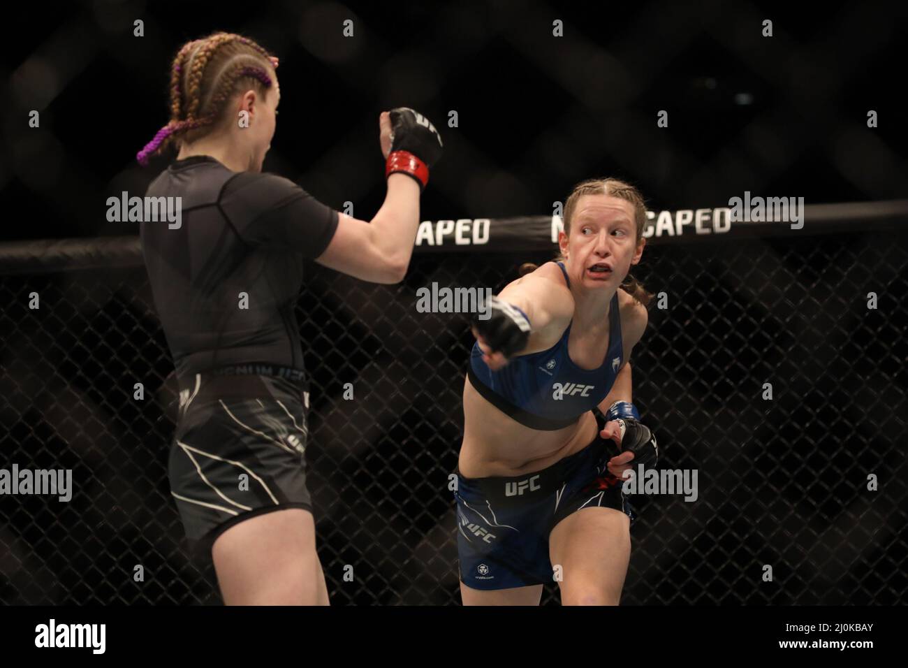 Alice Reed Ufc LONDON, UK - MARCH 19: (R-L) Elise Reed punches Cory McKenna in their ...