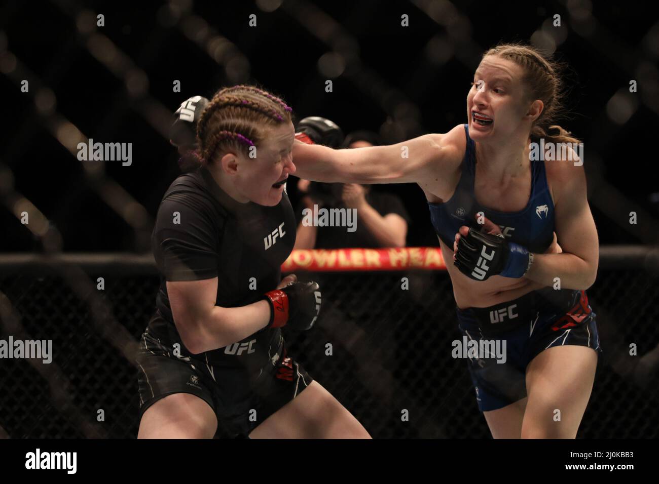 Elyse Reed LONDON, UK - MARCH 19: (R-L) Elise Reed punches Cory McKenna in their ...