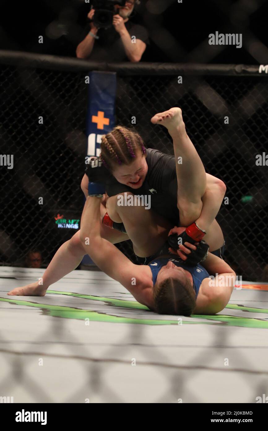 Elyse Reed LONDON, UK - MARCH 19: Cory McKenna (top) controls the body of Elise ...