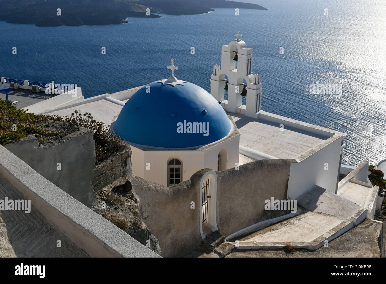Three Bells of Fira, Santorini, Greece, officially known as The Catholic Church of the Dormition, is a Greek Catholic church on the island of Santorin Stock Photo