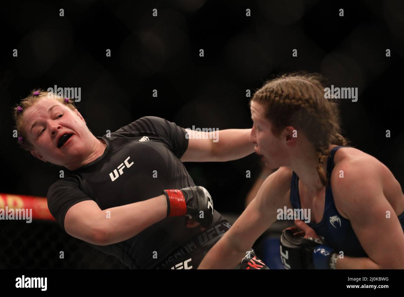 Alice Reed Ufc LONDON, UK - MARCH 19: (R-L) Elise Reed punches Cory McKenna in their ...