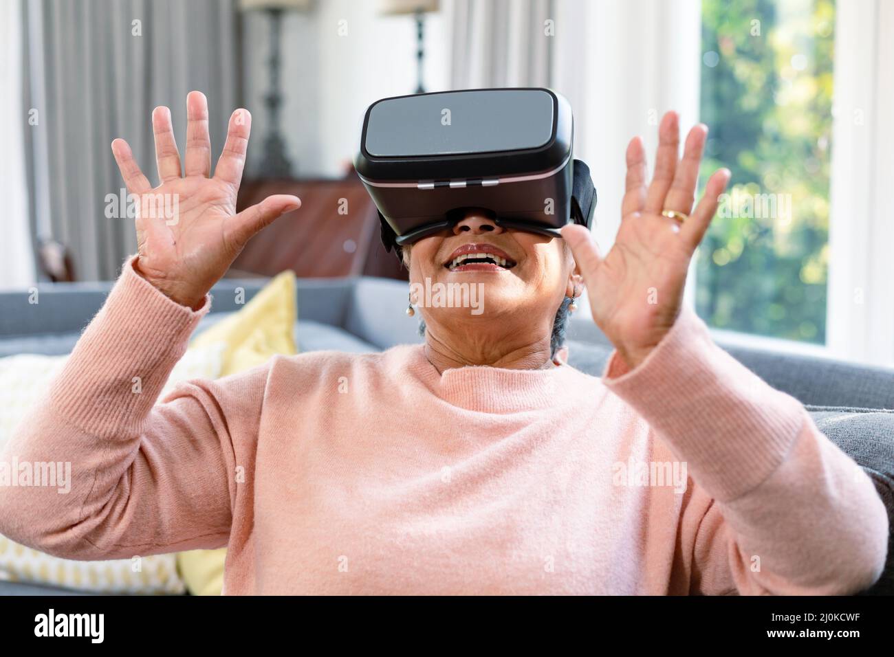 Woman relaxing home wearing vr hi-res stock photography and images - Alamy
