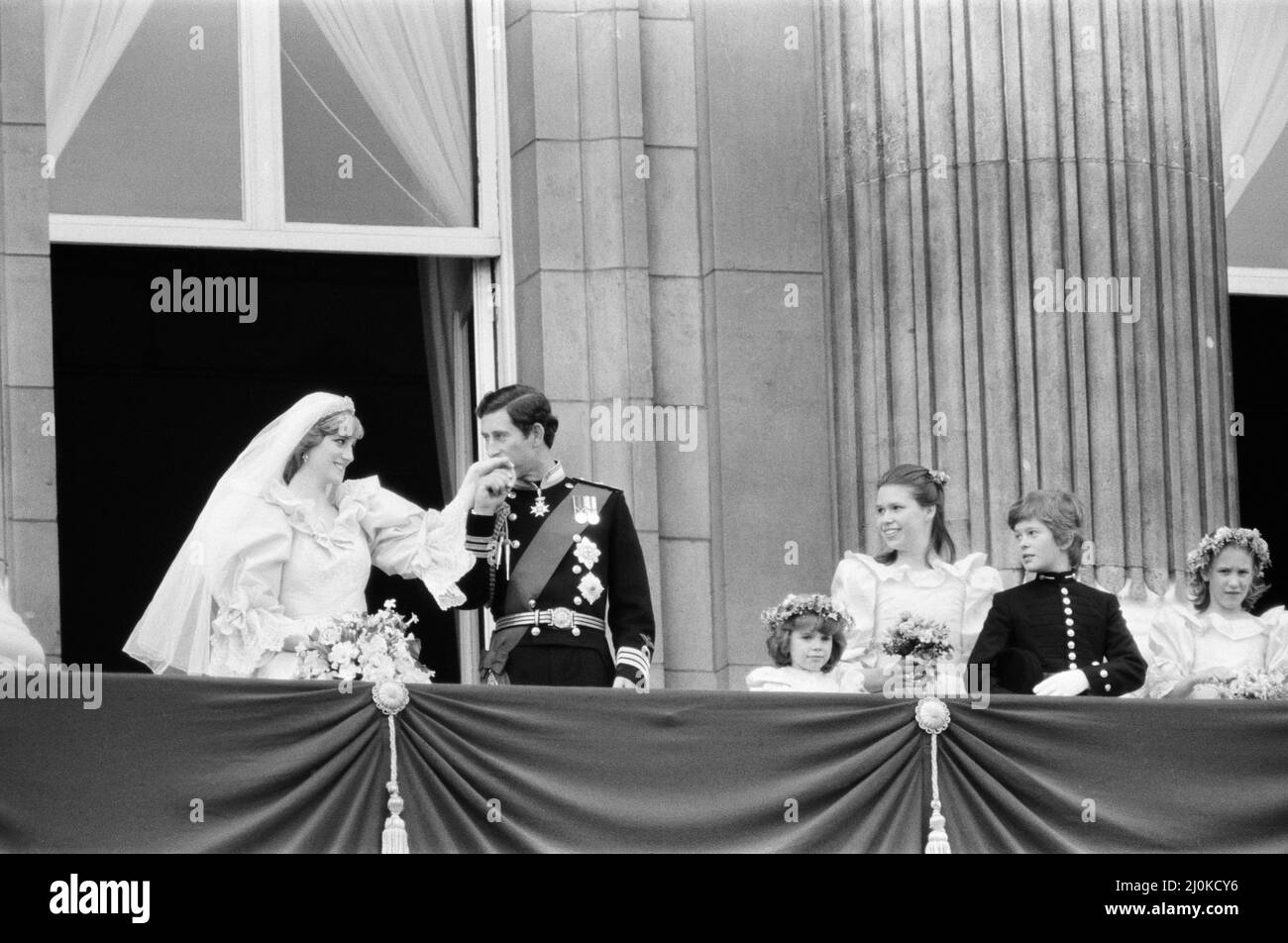 Prince Charles kissed the hand of his bride, Lady Diana Spencer. Picture taken of the happy couple on the balcony at Buckingham Palace after the wedding ceremony.  Picture taken 29th July 1981. Stock Photo