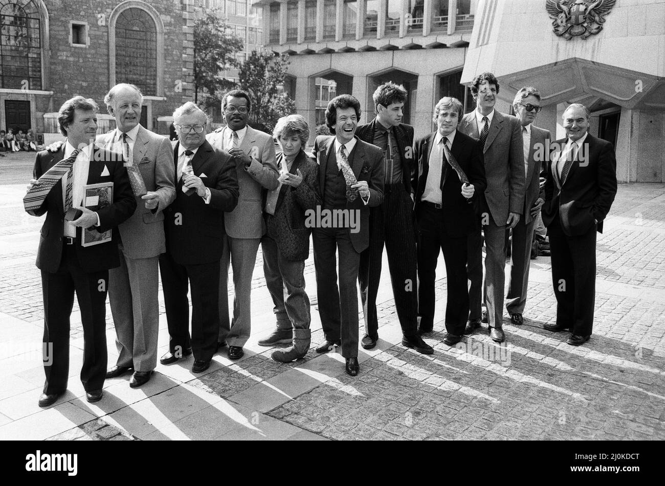 Tie Man of the Year Competition at the Guildhall. All the winners pose for a photograph, the group includes Johnny Briggs, Sir Harry Secombe, Trevor McDonald, Victoria Wood, Lionel Blair, Bob Geldof, Steve Smith, Chris Searle, Sir Peter Parker.  30th September 1982. Stock Photo