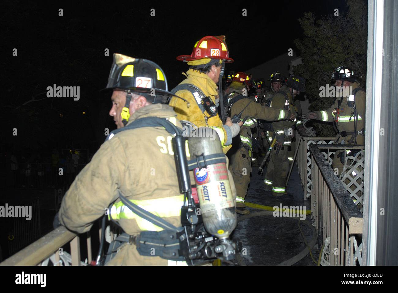San Diego Fire-Rescue firefighters working a structure fire Stock Photo