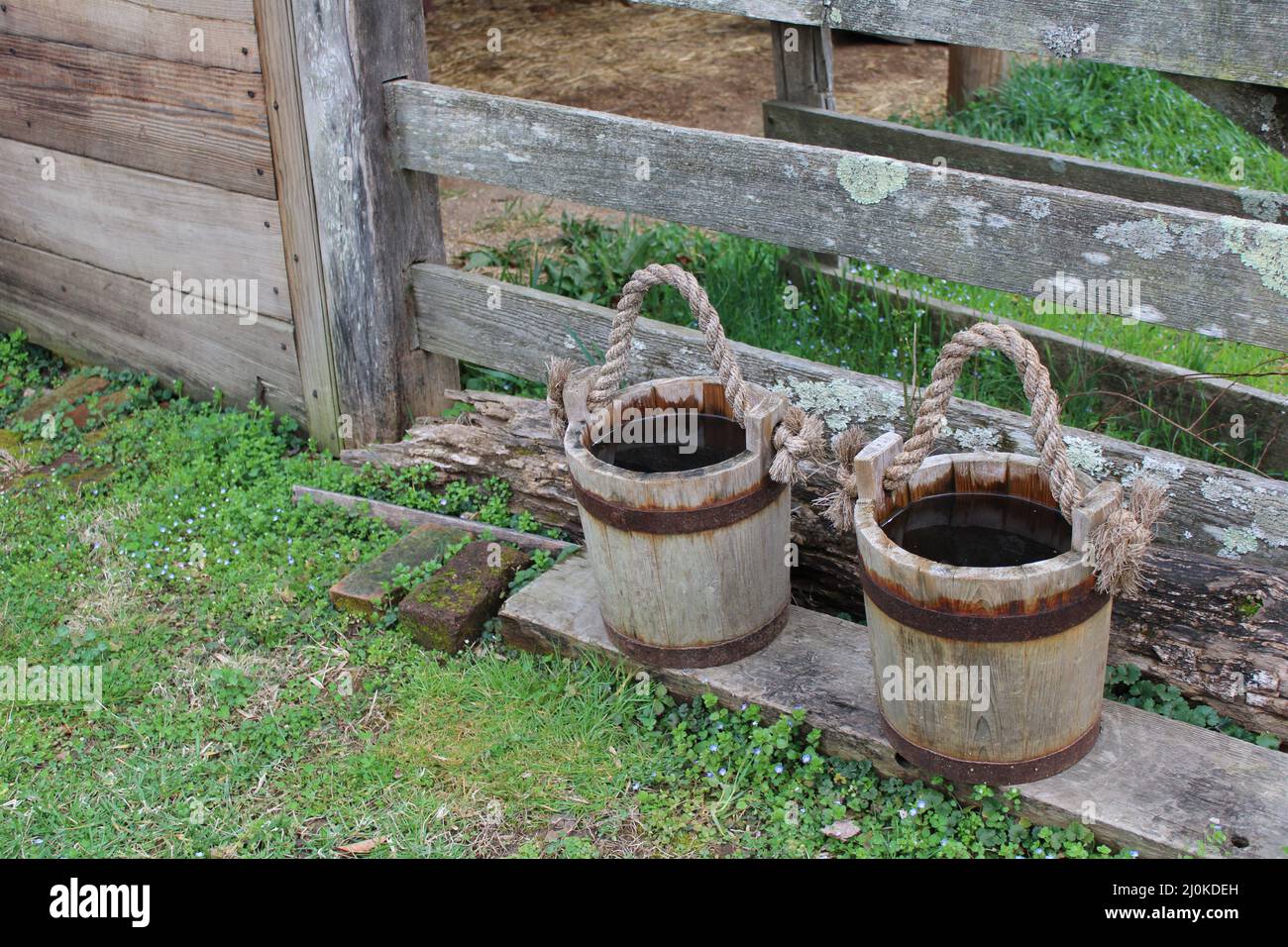 Two buckets filled with water Stock Photo Alamy