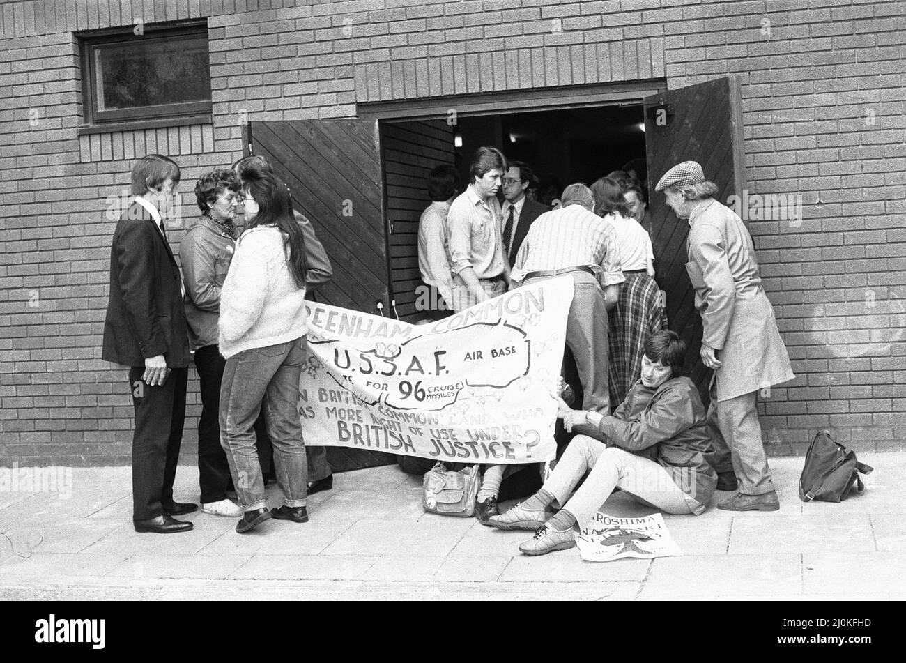 May 1982 Women from the 'Women's Peace Camp' at Greenham Common blockade the offices of Newbury District Council following the issuing of eviction notices to quit the camp. Council workers trying to clear the back entrance of the offices of protesters Stock Photo
