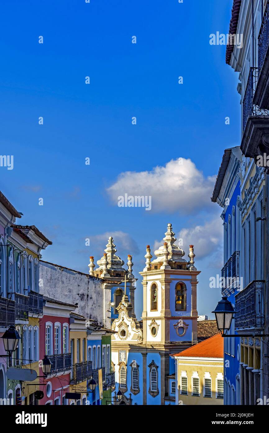 Old colorful houses facades and historic church towers in baroque and colonial style in Pelourinho district Stock Photo