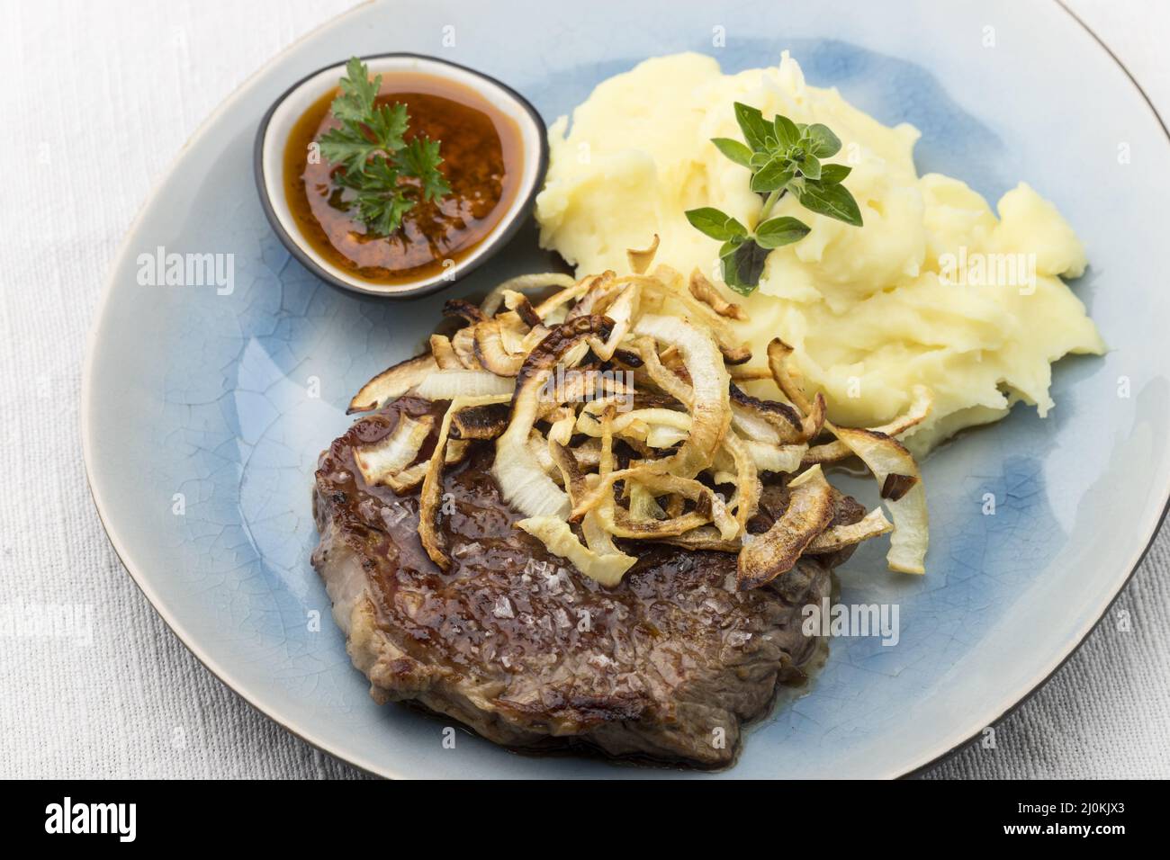 Steak with fried onions Stock Photo Alamy