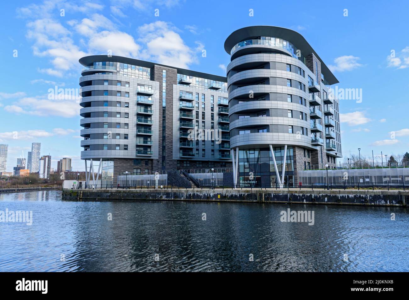 Two of the X1 Manchester Waters apartment blocks, by the Manchester Ship Canal, Pomona Island, Manchester, England, UK Stock Photo