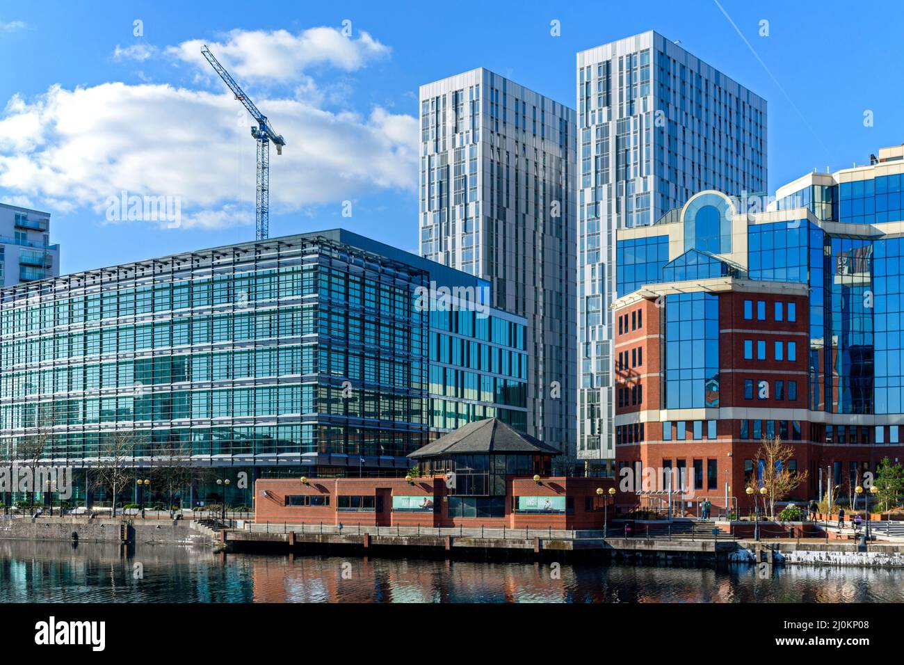 The X1 MediaCity apartment blocks and the Bupa Place building (formerly the Regent office block), from Erie Basin, Salford Quays, Manchester, UK Stock Photo