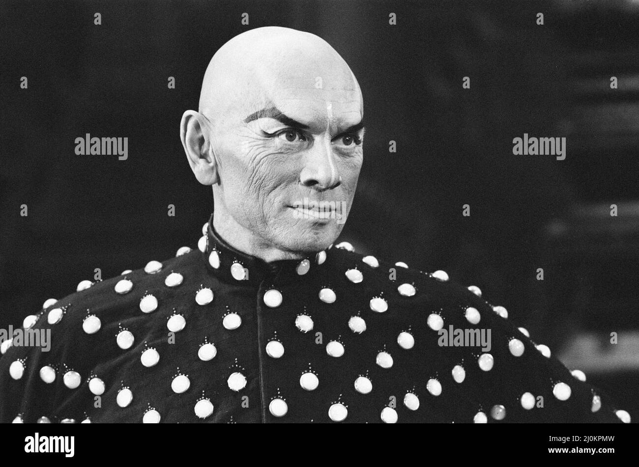 Yul Brynner, Actor at the London Palladium Theatre, 22nd August 1980. The King of Siam is in triumphant form these days, Actor Yul Brynner has clocked up his 3000th performance as the ruler in the hit musical, The King and I, but the imposing star with a reputationfor being hard to approach is staying tight-lipped about hit achievement. At the London Palladium, where the show has smashed box-office records, he merely said: 'It's been a long time'. Brynner bows out of the part next month. And no doubt he'll receive a Royal send off. Stock Photo
