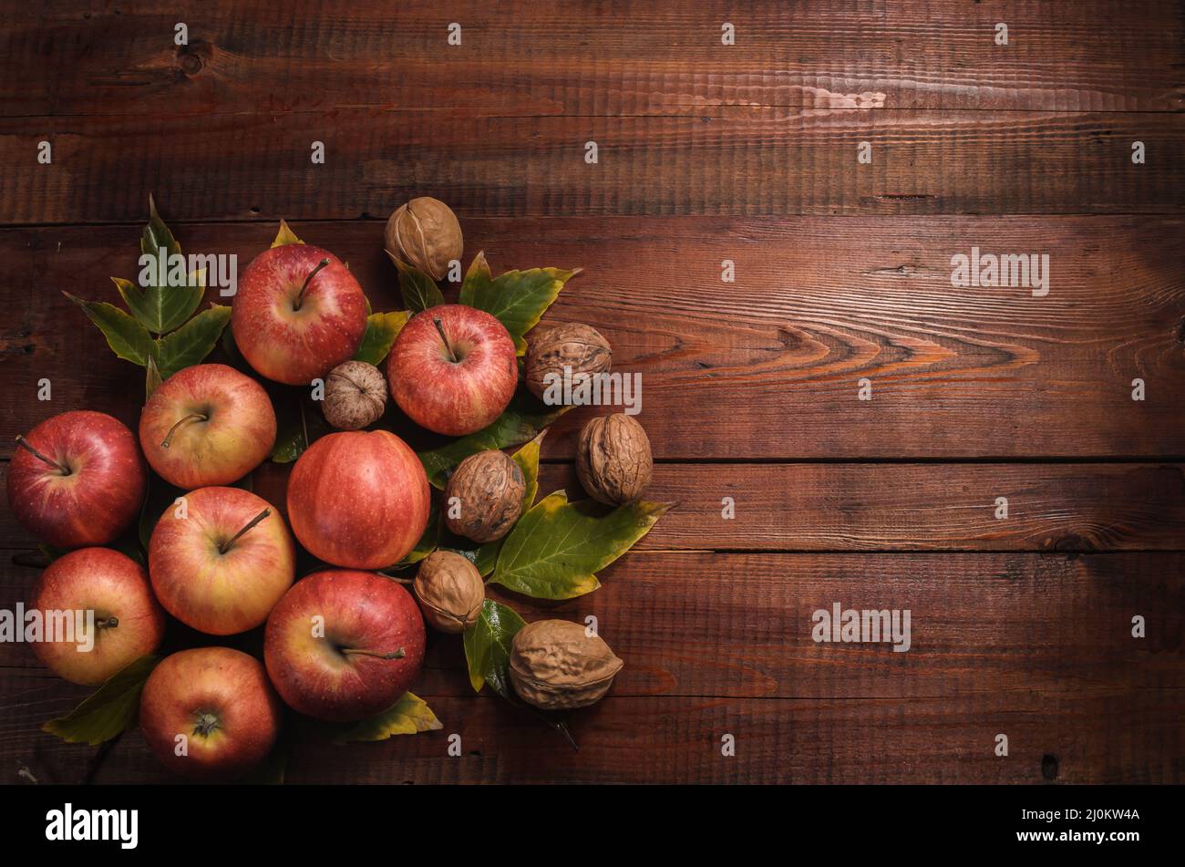 Apples on a dark wooden background in a rustic style Stock Photo