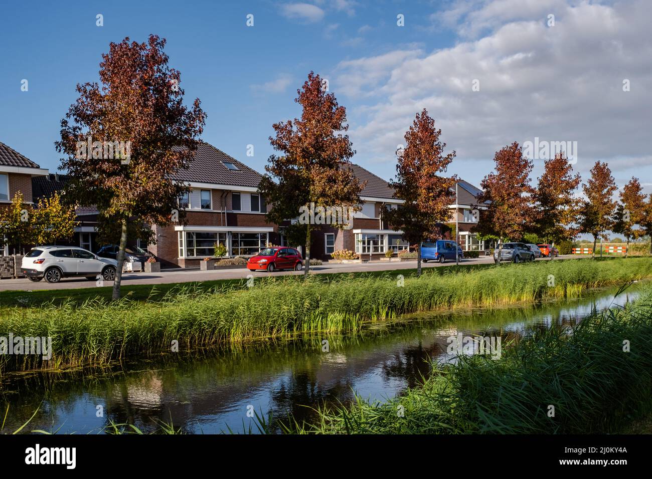 Dutch Suburban area with modern family houses, newly build modern family homes in the Netherlands, dutch family house, apartment Stock Photo