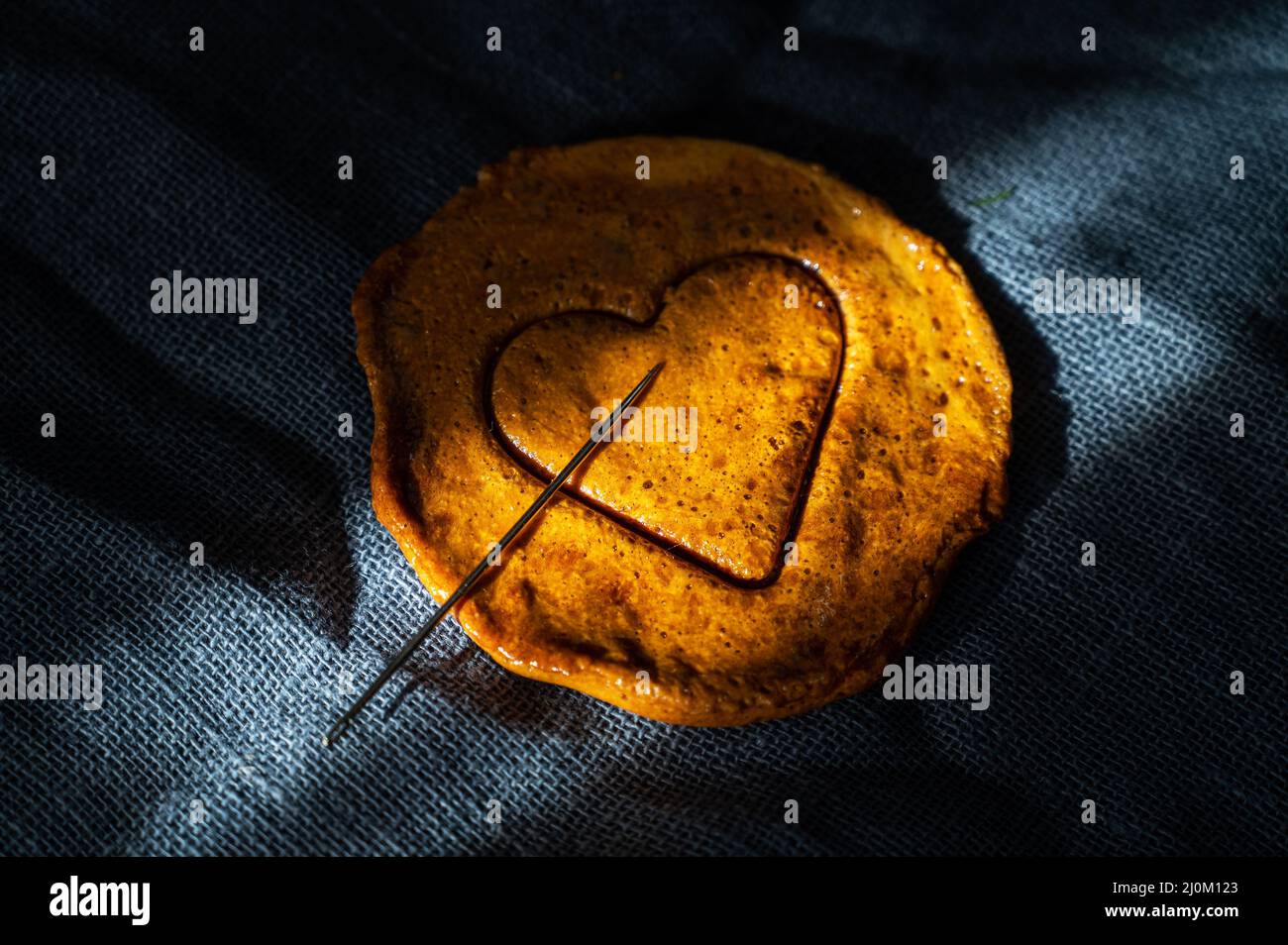 Brown sugar caramel candy cookies with a metal needle Stock Photo