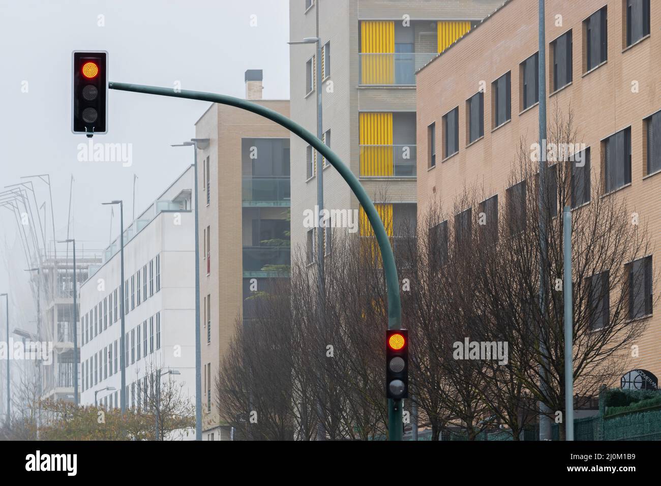 Traffic light showing the yellow light on the road Stock Photo Alamy