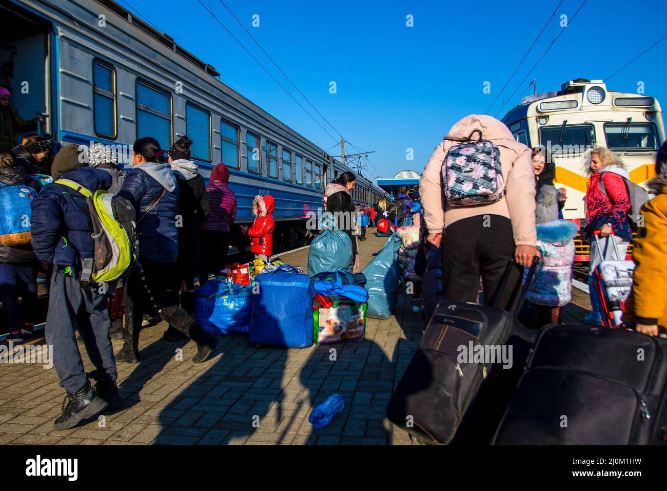 Przemysl, Poland. 19th Mar, 2022. People are seen boarding a train to Lviv. Ukrainians return to Ukraine from Poland by train. Some were returning after being unable to find resource in Poland others where going back to help their families. Credit: SOPA Images Limited/Alamy Live News Stock Photo