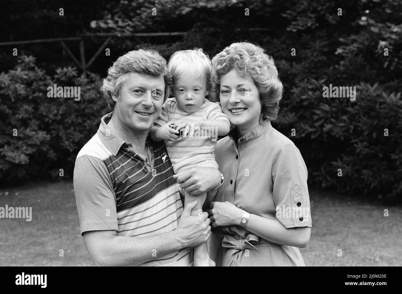 Michael Aspel pictured at home with his wife Lizzie Power and their son ...