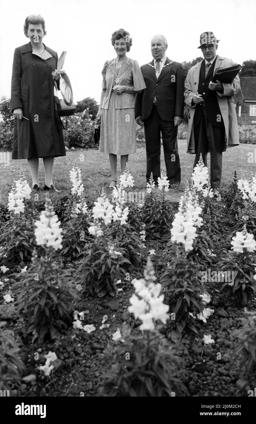 The village of Earsdon, North Tyneside, was in full bloom for judges from the Britain in Bloom competition. Judges Ellis Wood and Mrs K. Clark make an inspection watched by North Tyneside's deputy Mayor and Mayoress, Couns, John and Irene Hall. 3rd July 1981. Stock Photo