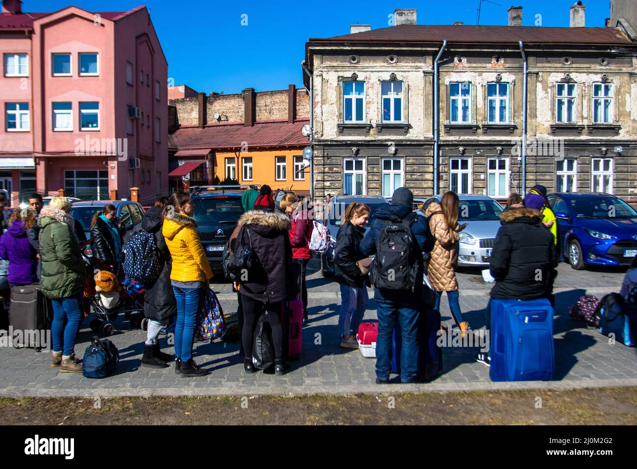 Przemysl, Poland. 18th Mar, 2022. People wait to board a train heading to Lviv. Ukrainians return to Ukraine from Poland by train. Some were returning after being unable to find resource in Poland others where going back to help their families. (Photo by Ty O'Neil/SOPA Images/Sipa USA) Credit: Sipa USA/Alamy Live News Stock Photo