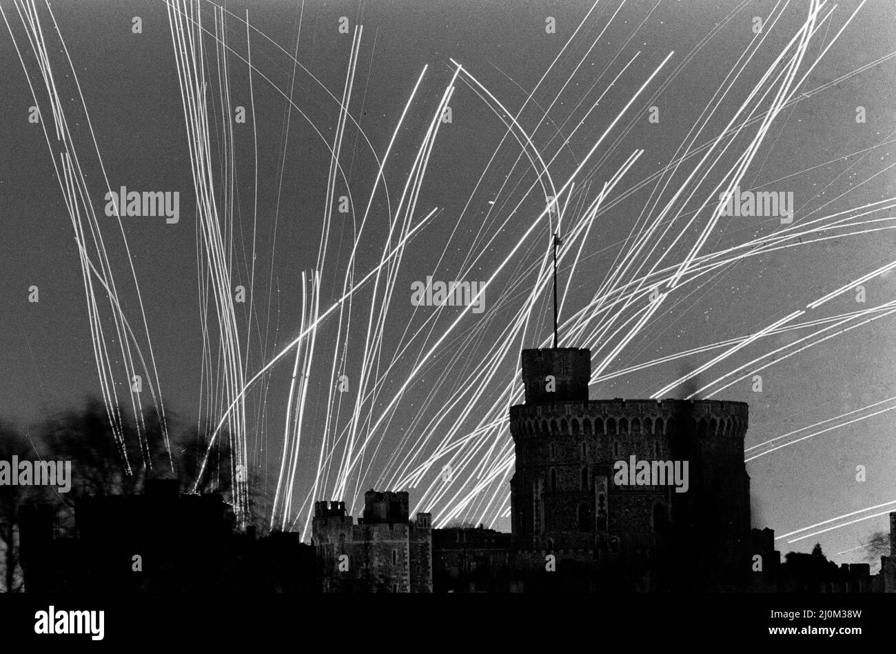 This is the bustling sky over Windsor Castle, which is five miles away from Heathrow Airport and under on of the main flight paths. Taken during a period of two and a half hours one evening, this amazing picture shows the trailing lights of more than thirty planes. The lines are take-off lights, the dots wing-tip lights 5th January 1981 Stock Photo