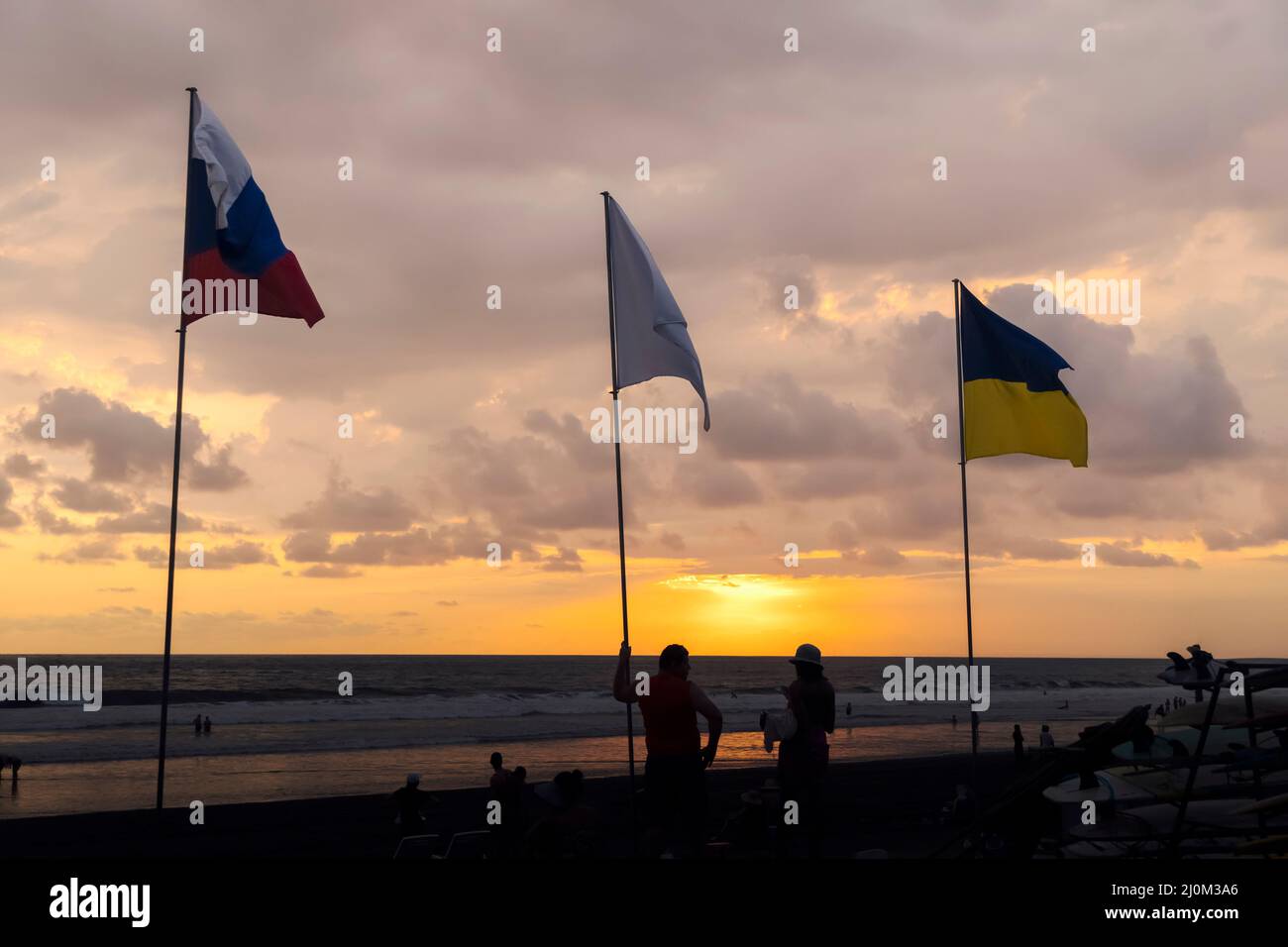 Ukraine and Russia official national flag on blue sky background at sunset.Flag for peace . Stock Photo