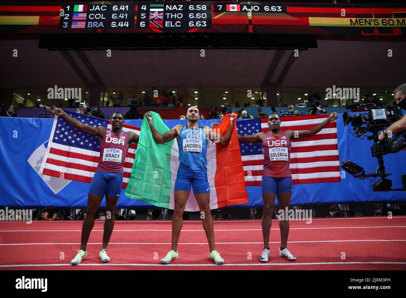 Belgrade, Serbia. 19th Mar, 2022. Gold medalist Lamont Marcell Jacobs (C) of Italy, silver medalist Christian Coleman (R) of the United States and bronze medalist Marvin Bracy of the United States, pose after the men's 60m final at the World Athletics Indoor Championships Belgrade 2022 in Stark Arena, Belgrade, Serbia, March 19, 2022. Credit: Zheng Huansong/Xinhua/Alamy Live News Stock Photo