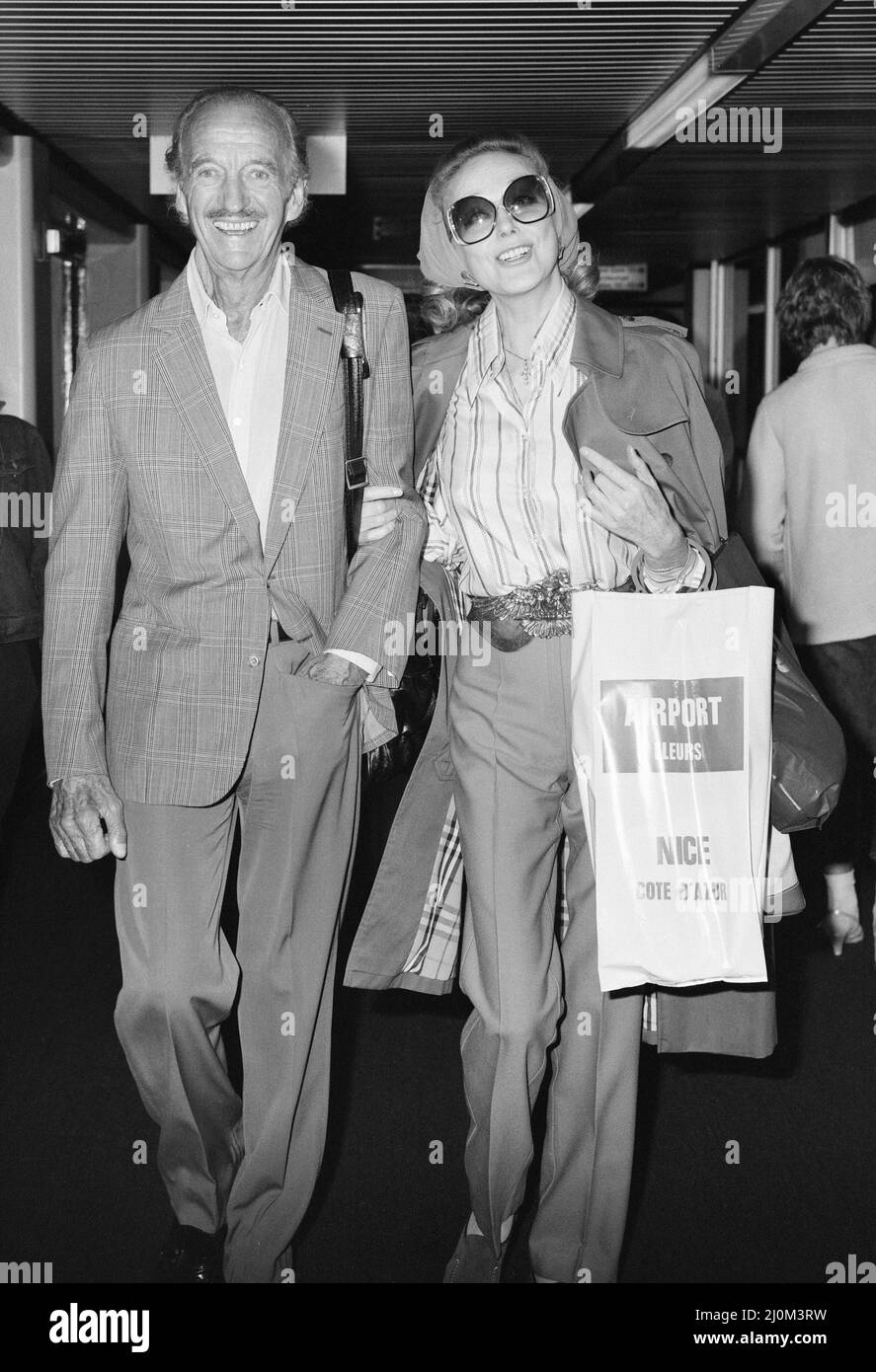 David Niven, British actor with wife Hjordis Paulina Genberg Tersmeden at London Heathrow Airport, arriving from Nice, 1st September 1982. Stock Photo