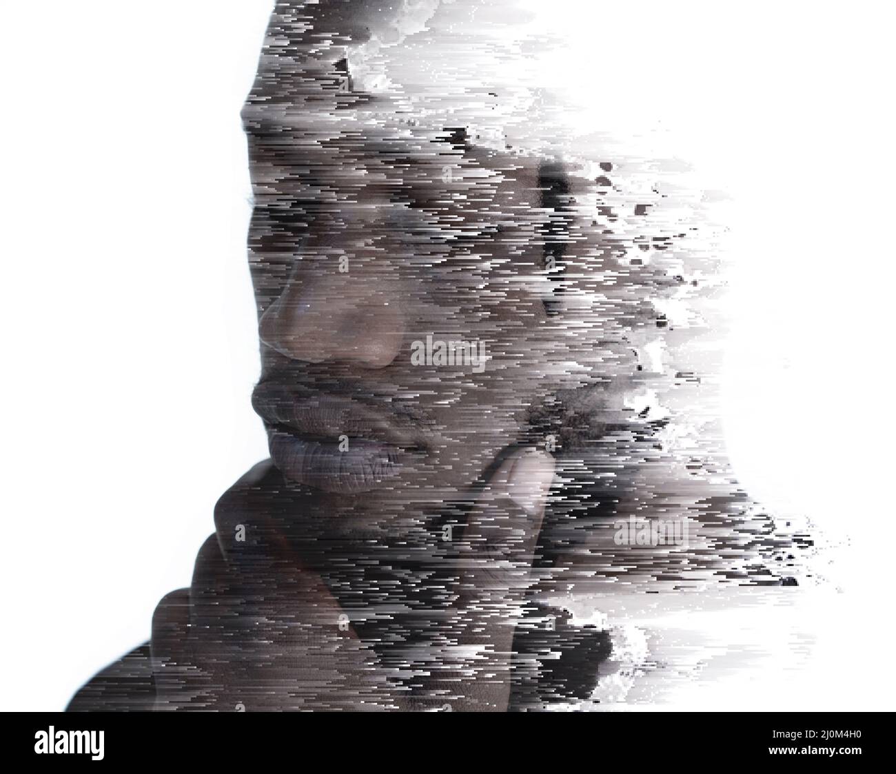 A portrait of a man combined with digital art in a double exposure