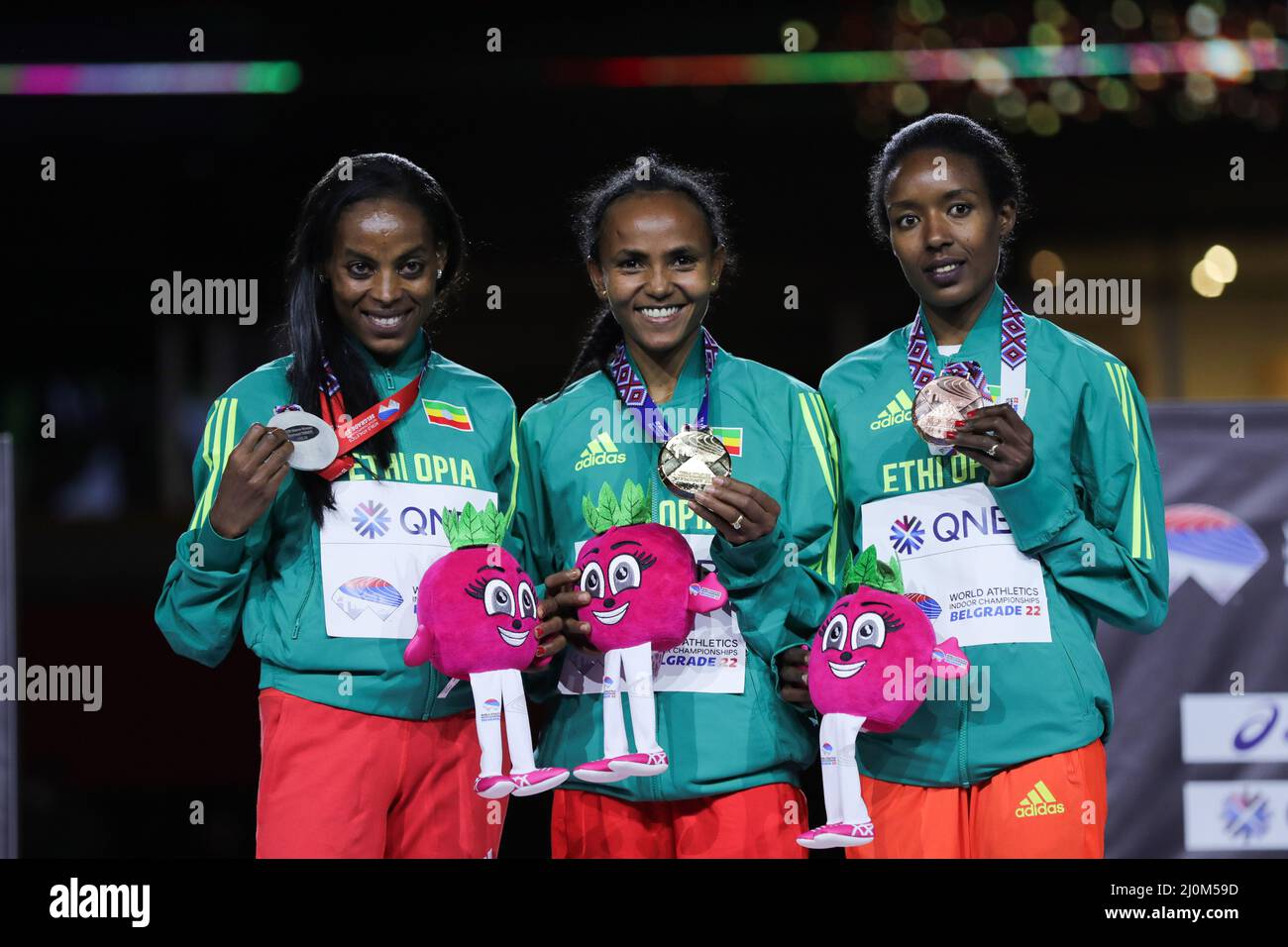 Belgrade, Serbia. 19th Mar, 2022. First-placed Gudaf Tsegay (C), second-placed Axumawit Embaye (L) and third-placed Hirut Meshesha of Ethiopia pose during the awarding ceremony for the women's 1500m event at the World Athletics Indoor Championships Belgrade 2022 in Stark Arena, Belgrade, Serbia, March 19, 2022. Credit: Zheng Huansong/Xinhua/Alamy Live News Stock Photo