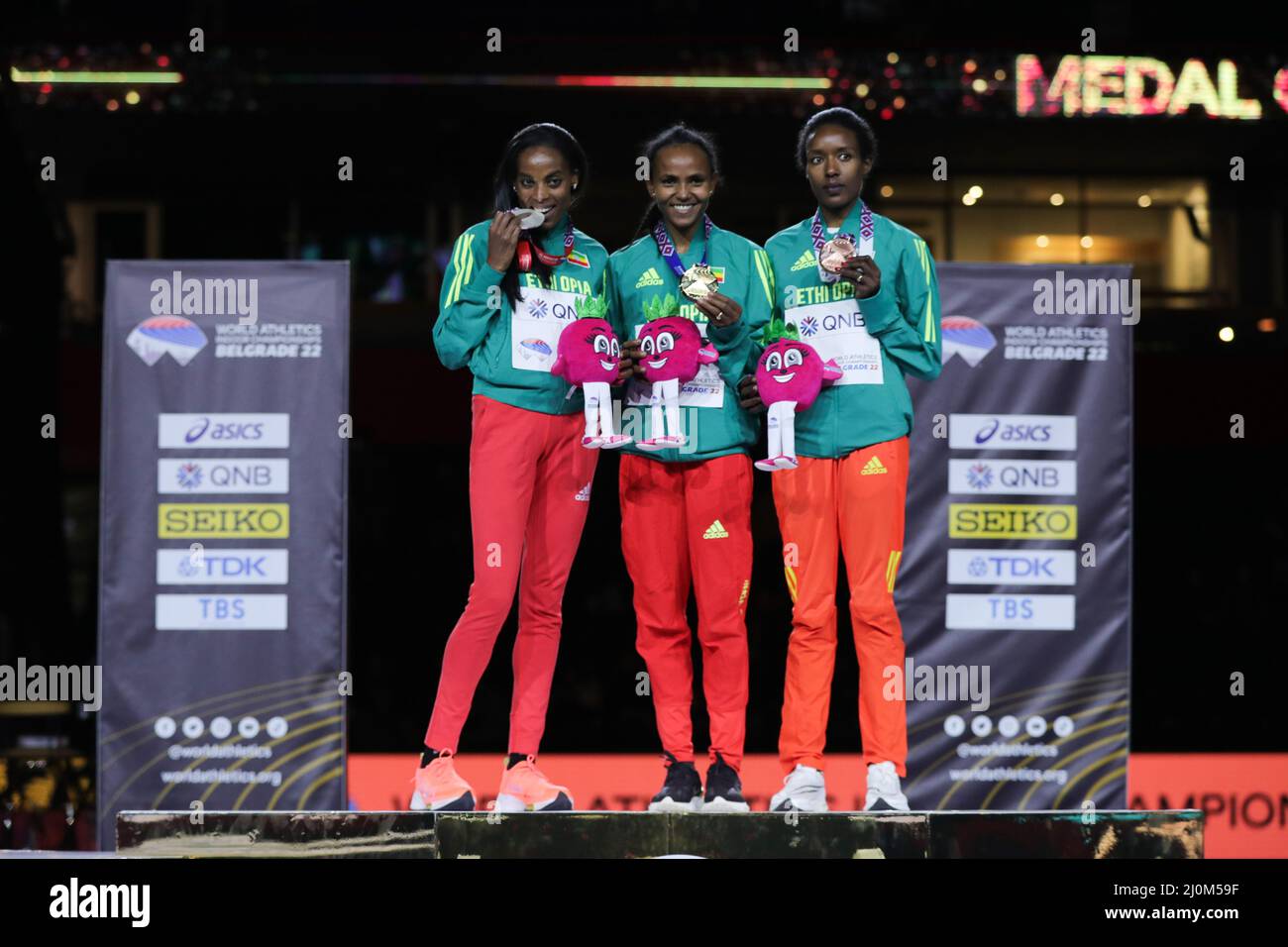 Belgrade, Serbia. 19th Mar, 2022. First-placed Gudaf Tsegay (C), second-placed Axumawit Embaye (L) and third-placed Hirut Meshesha of Ethiopia pose during the awarding ceremony for the women's 1500m event at the World Athletics Indoor Championships Belgrade 2022 in Stark Arena, Belgrade, Serbia, March 19, 2022. Credit: Zheng Huansong/Xinhua/Alamy Live News Stock Photo