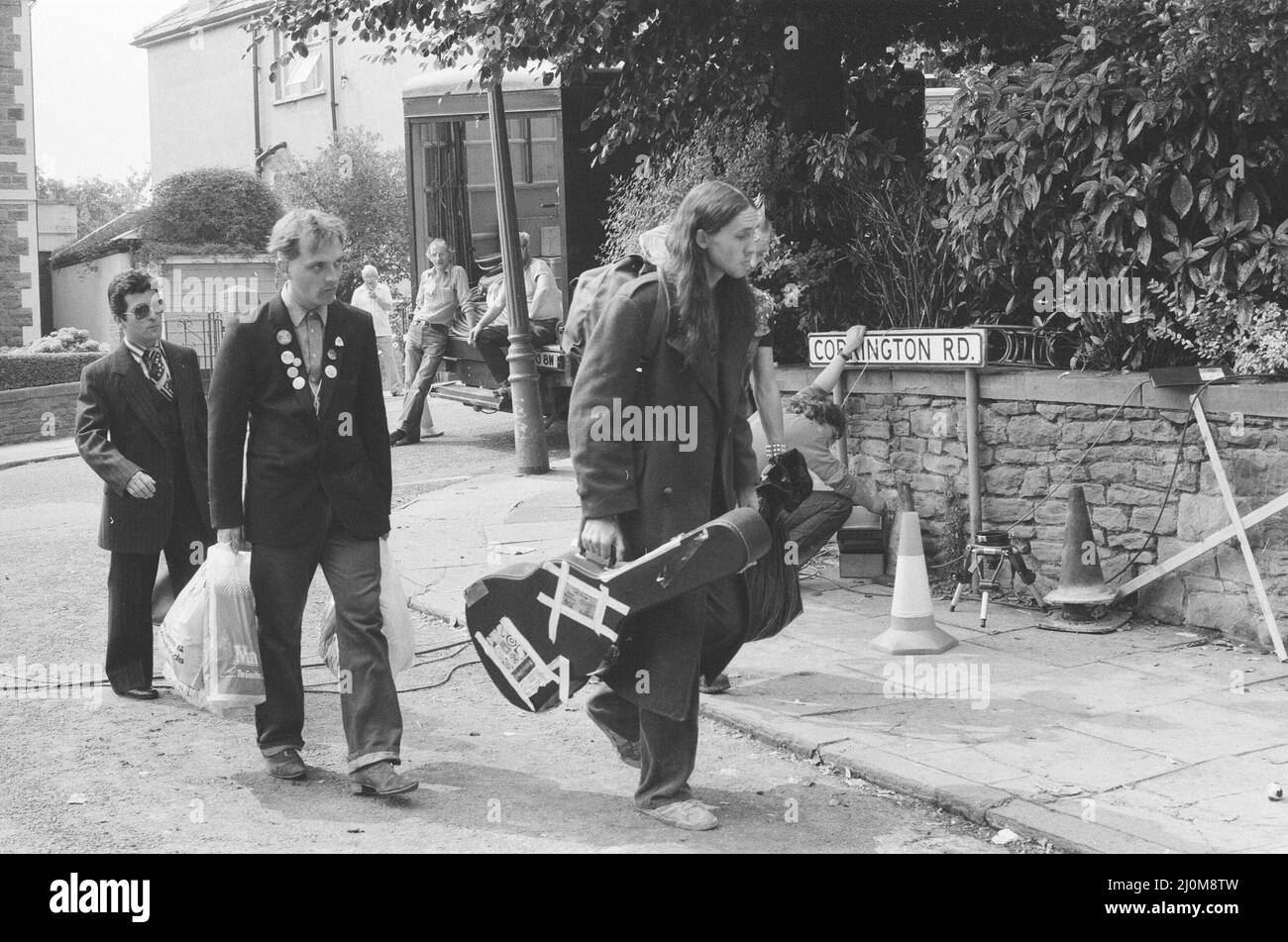 The cast of the Young Ones seen here filming on location at Codrington Road, Bristol. Right to Left  Nigel Planer as Neil, Rik Mayall as Rick, Chris Ryan as Mike. August 1982. Stock Photo