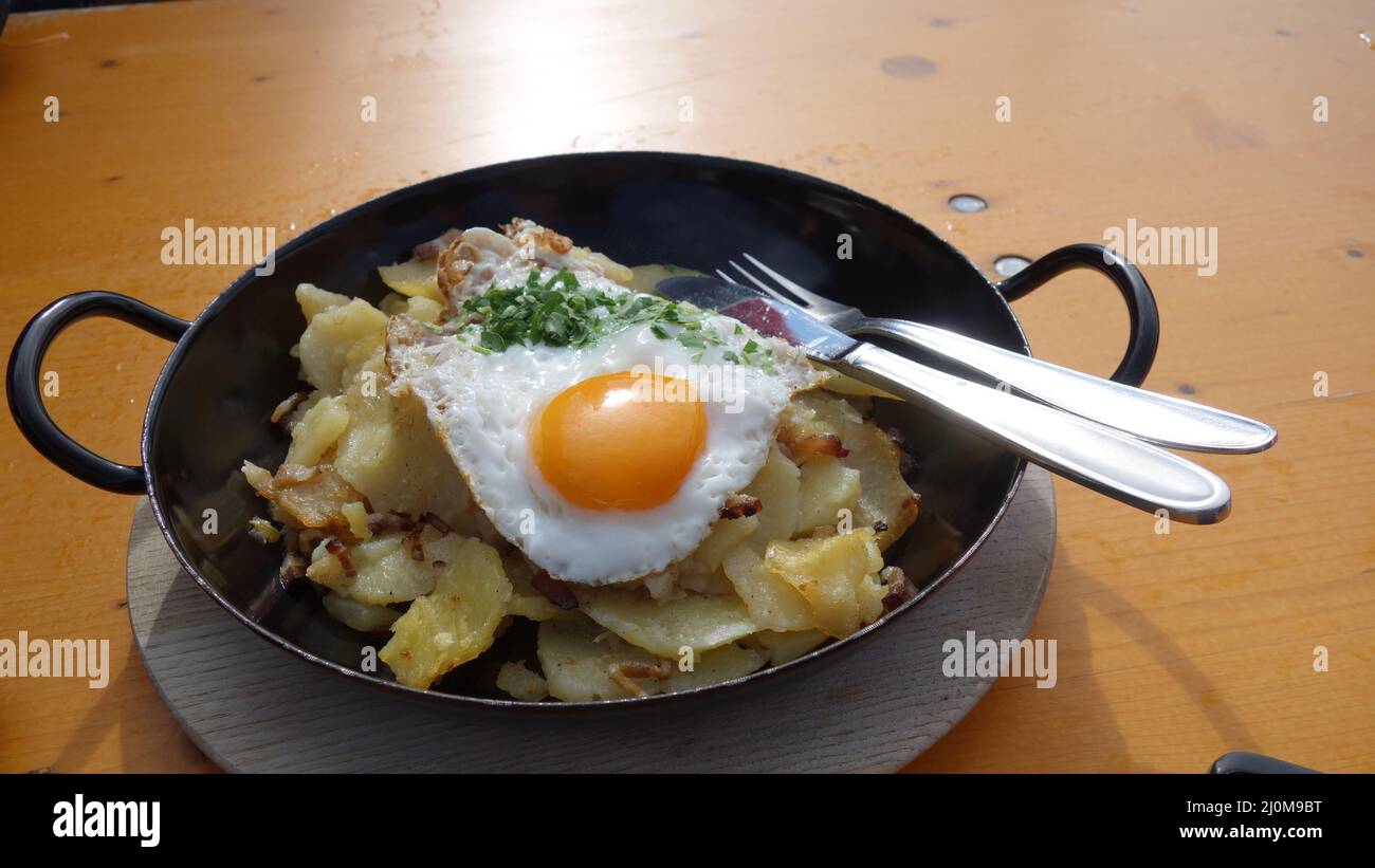 Austrian Gröstl, with potatoes and eggs Stock Photo