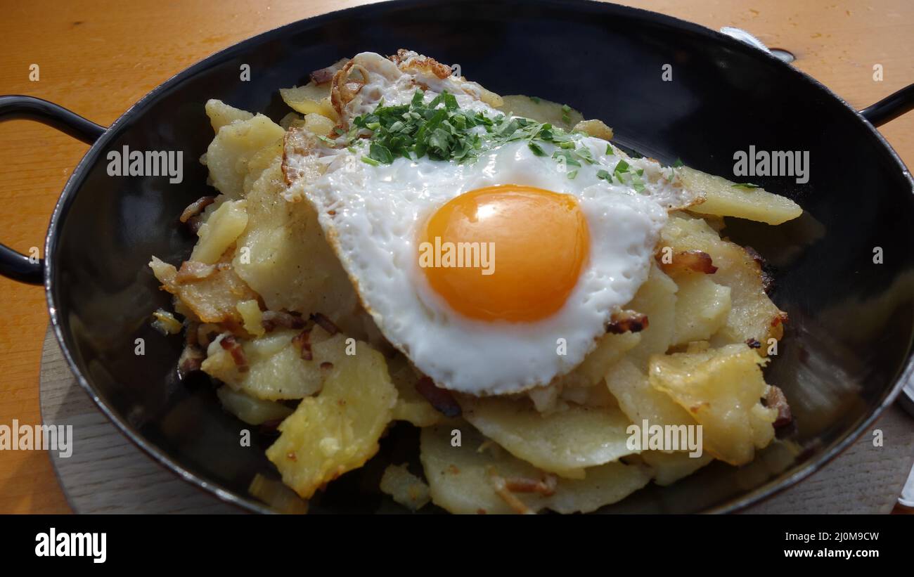 Austrian Gröstl, with potatoes and eggs Stock Photo
