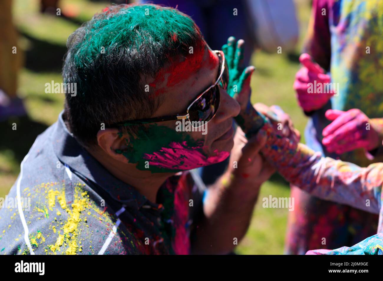 Dad and his son at Holi Festival Stock Photo