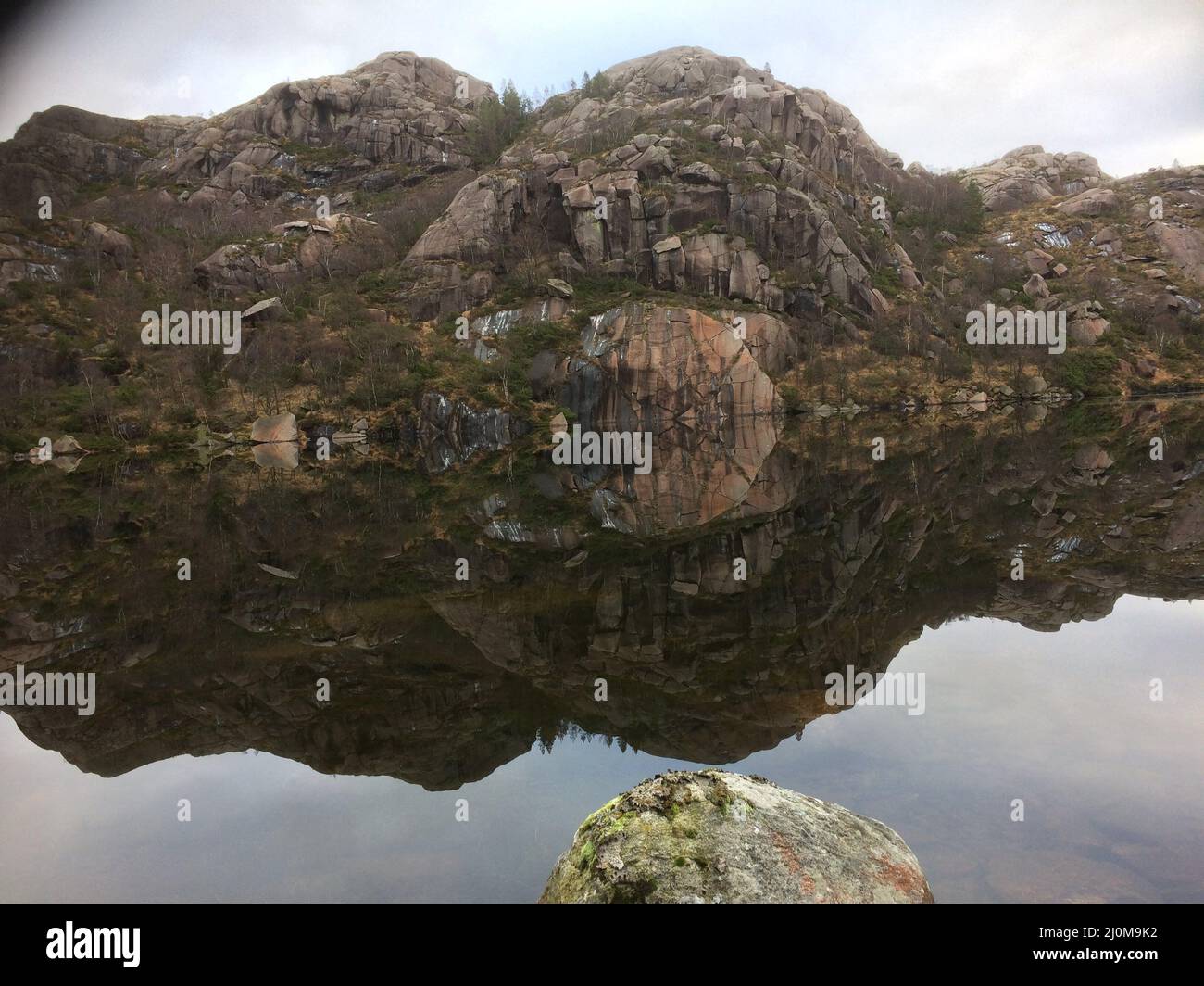 Mountain landscape mirror in lake, Norway Stock Photo