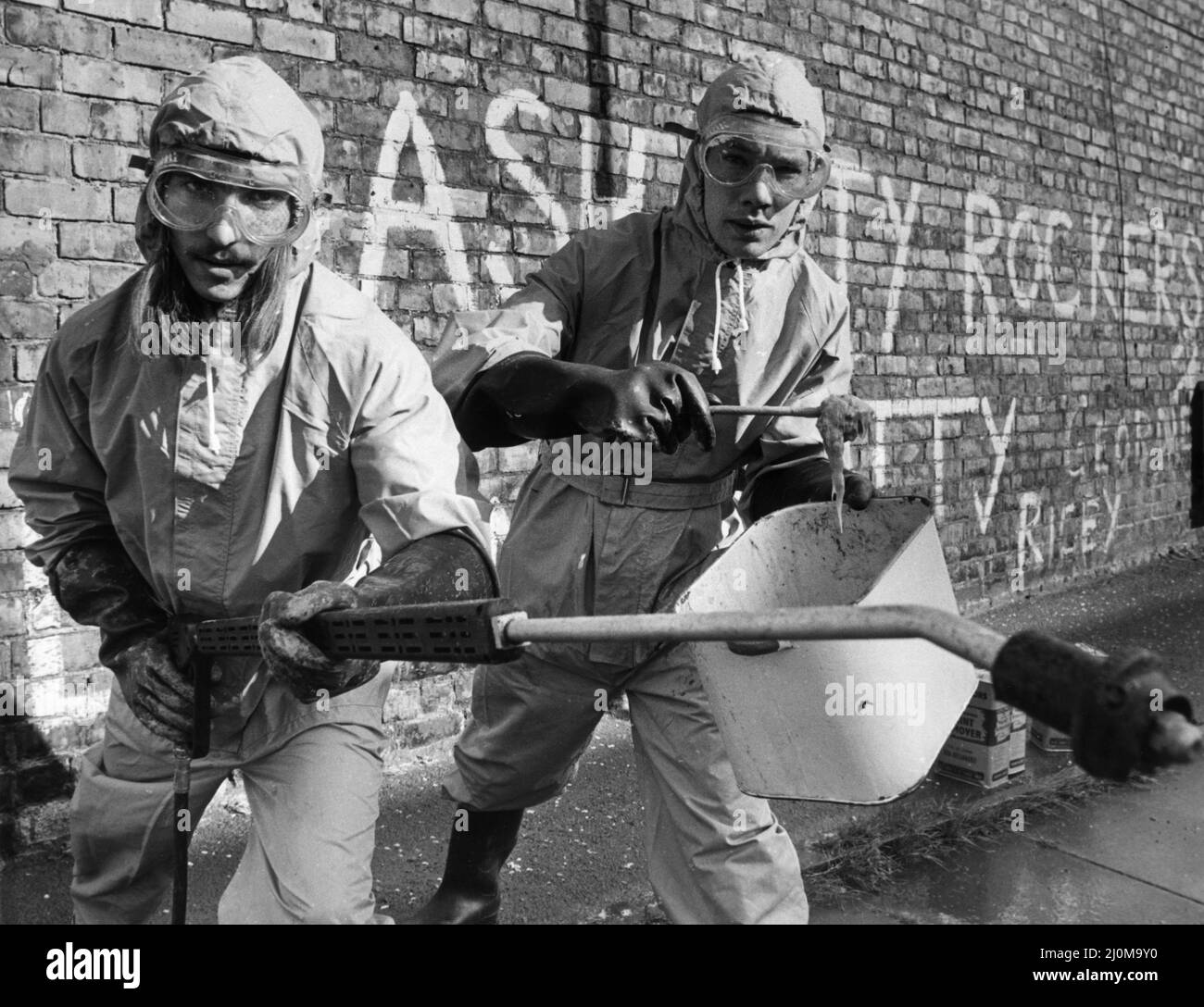 The Graffiti Beater, a new £2,000 machine has just gone into action in the West End of Newcastle, Published 24th September 1981.  With the help of youngsters on YOP Schemes, Youth Opportunities Programmes, clad in their space age protective suits, the machine will be cleaning up Graffiti on walls and buildings around the area.   The machine uses a special solvent and high pressure hose. Stock Photo