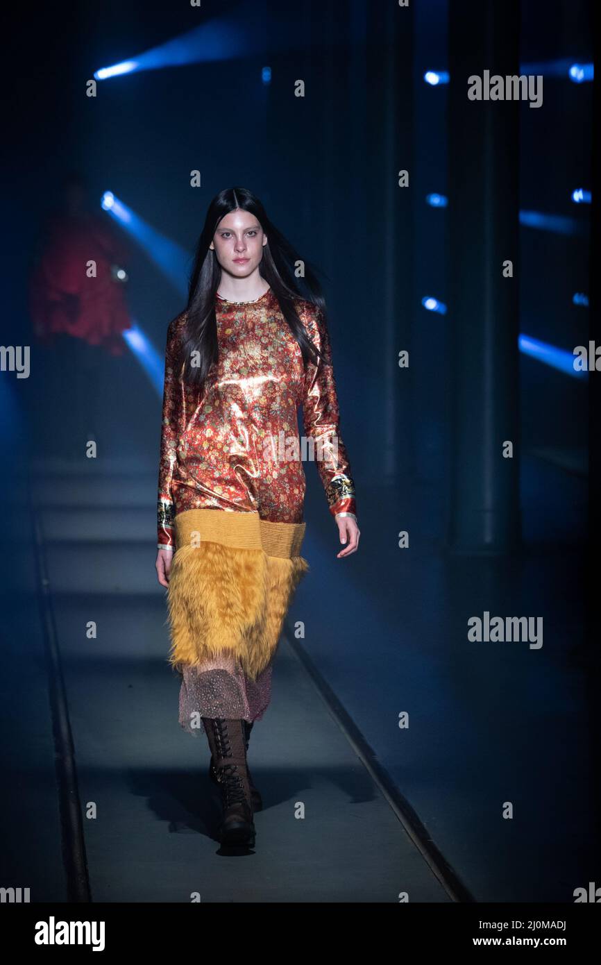A model walks the runway with the collection of the brand April&Alex ...